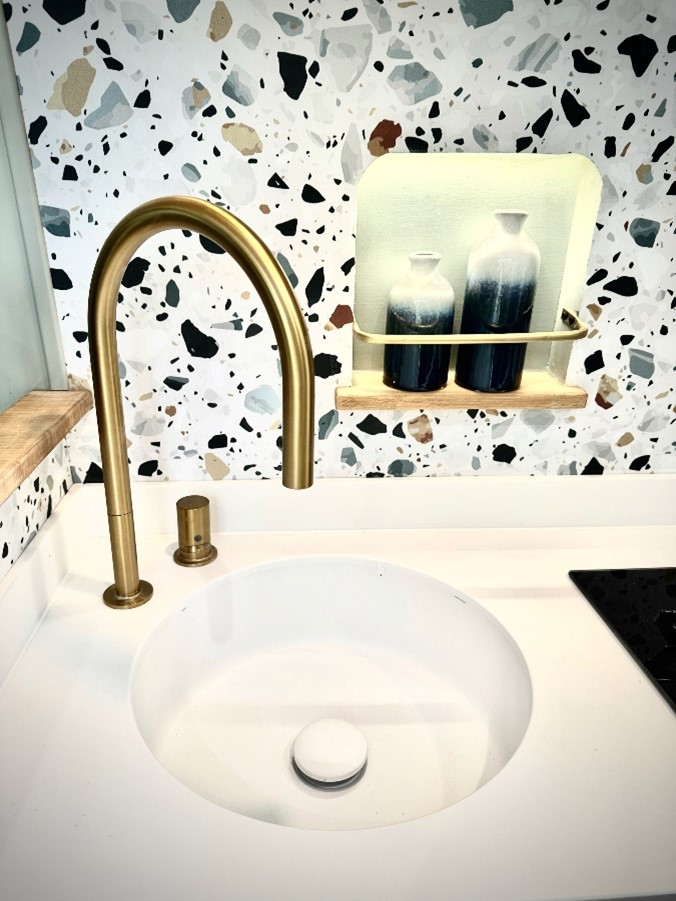 The solid surface brings seamless design and durability to deluxe campervans