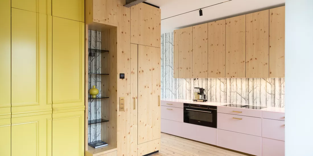 Pretty in Pink: HIMACS in Ruby crowns a contemporary kitchen  – and Banana yellow brightens up a bathroom