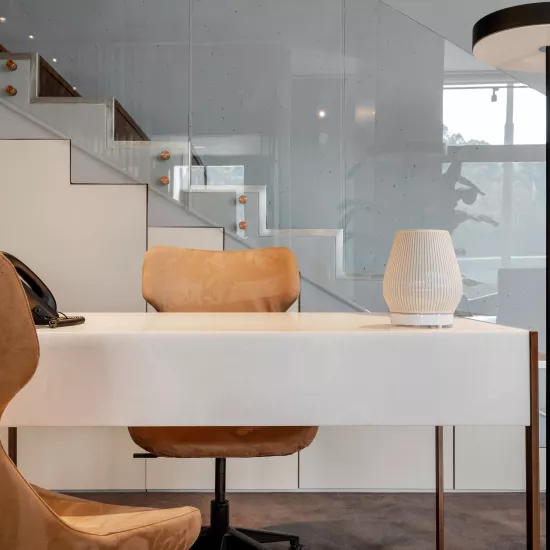 The ethereal aesthetics of HIMACS Pavia in a chic, industrial office design