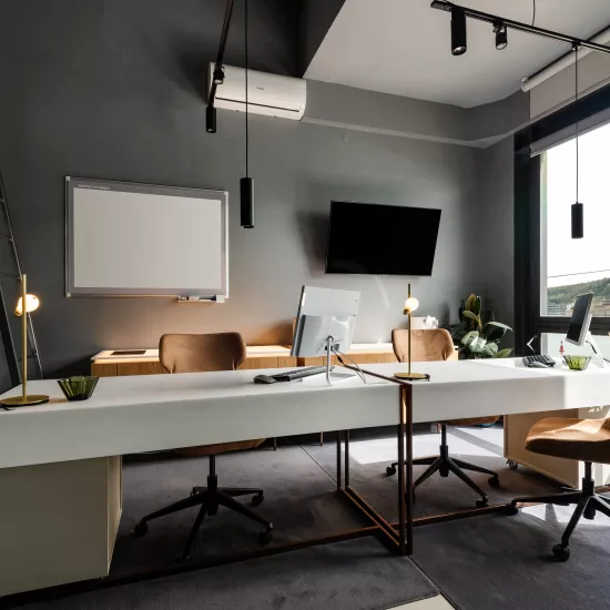 The ethereal aesthetics of HIMACS Pavia in a chic, industrial office design