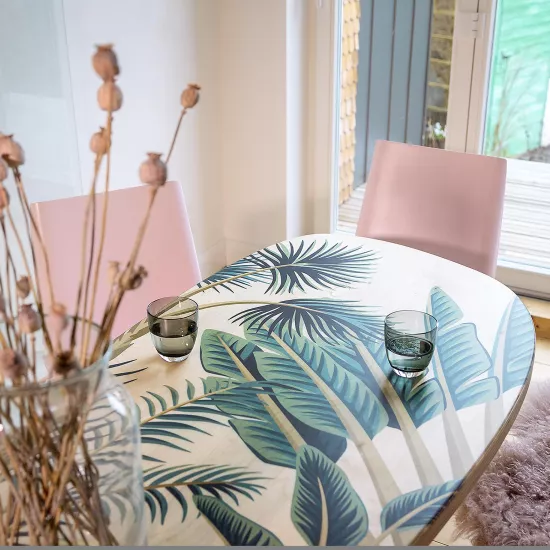 Pretty in Pink: HIMACS in Ruby crowns a contemporary kitchen  – and Banana yellow brightens up a bathroom