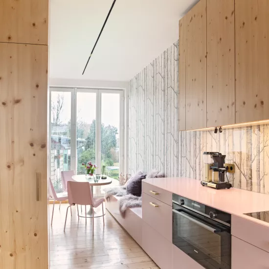 Pretty in Pink: HIMACS in Ruby crowns a contemporary kitchen  – and Banana yellow brightens up a bathroom