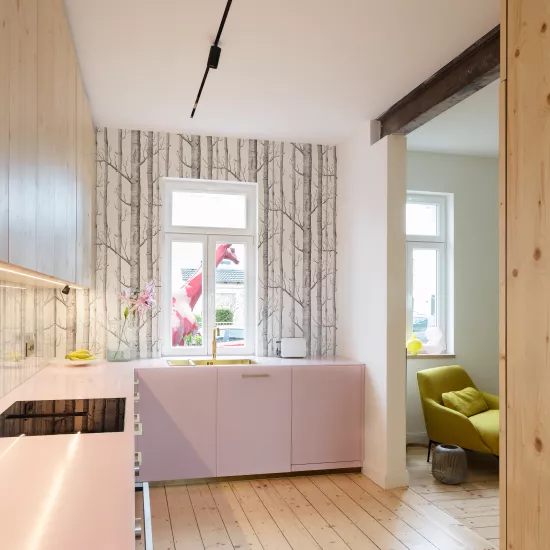 Pretty in Pink: HIMACS in Ruby crowns a contemporary kitchen  – and Banana yellow brightens up a bathroom