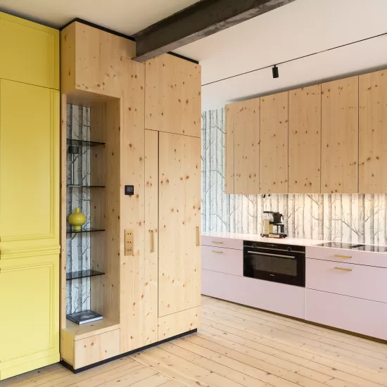 Pretty in Pink: HIMACS in Ruby crowns a contemporary kitchen  – and Banana yellow brightens up a bathroom