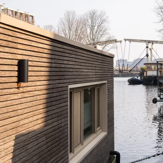 A Life Afloat HIMACS transforms a houseboat in Amsterdam
