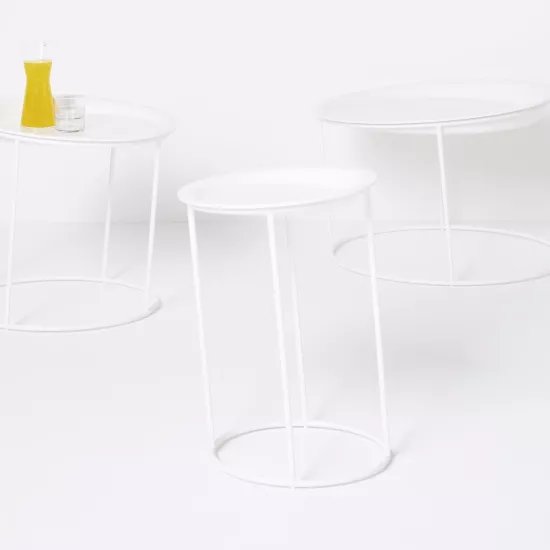 “Dizzy” Tables by Karl Andersson & Söner