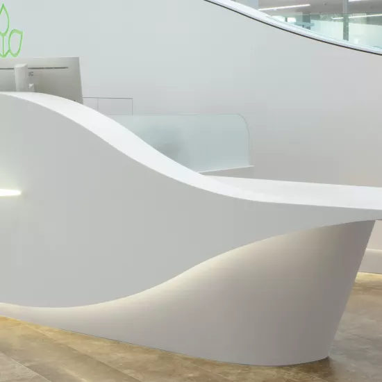 A captivating HIMACS reception desk for AOK offices