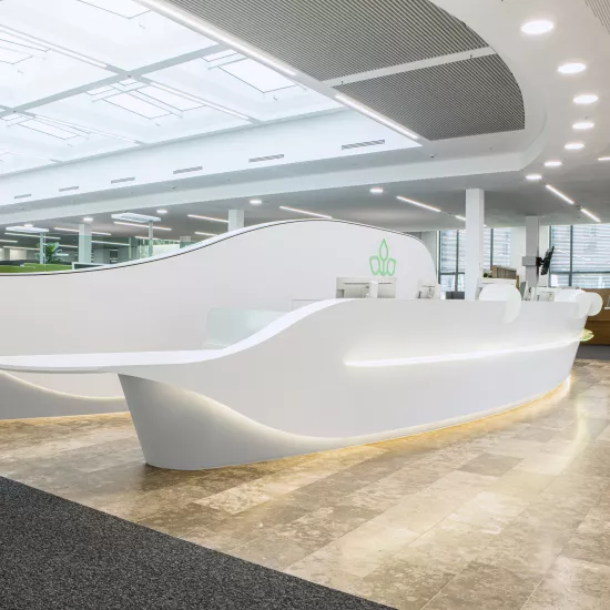 A captivating HIMACS reception desk for AOK offices
