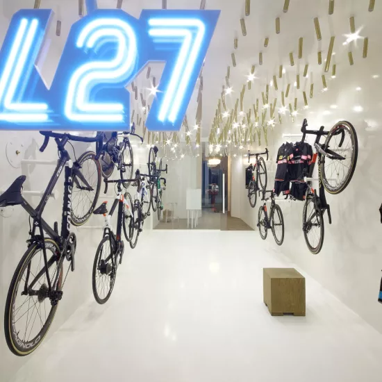 The interior  of a bike & coffee shop featuring HIMACS