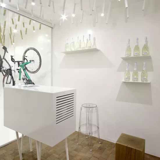 The interior  of a bike & coffee shop featuring HIMACS