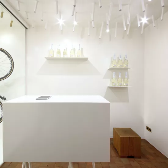 The interior  of a bike & coffee shop featuring HIMACS