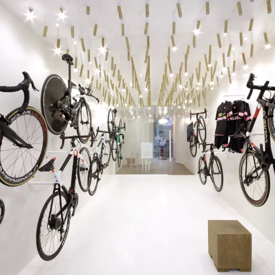 The interior  of a bike & coffee shop featuring HIMACS