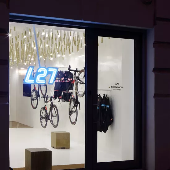 The interior  of a bike & coffee shop featuring HIMACS