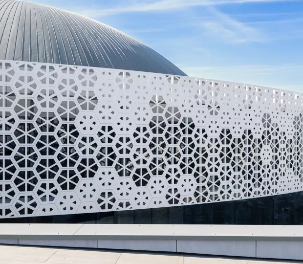 Urania Sports & Entertainment Centre in Olsztyn Showcases Unique HIMACS Facade