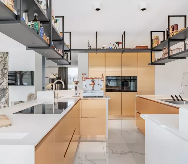 Contrasting finishes: HIMACS and copper shine brightly in this kitchen