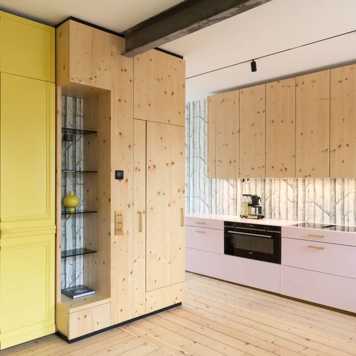 Pretty in Pink: HIMACS in Ruby crowns a contemporary kitchen  – and Banana yellow brightens up a bathroom