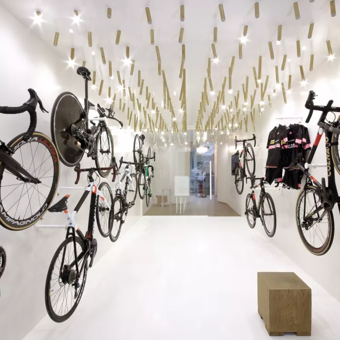 The interior  of a bike & coffee shop featuring HIMACS