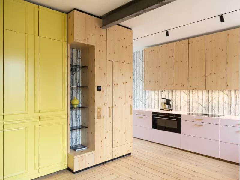 Pretty in Pink: HIMACS in Ruby crowns a contemporary kitchen  – and Banana yellow brightens up a bathroom