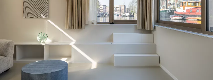 A Life Afloat HIMACS transforms a houseboat in Amsterdam