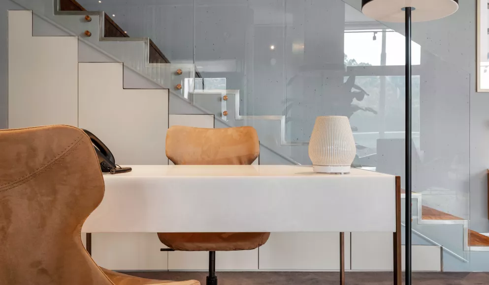 The ethereal aesthetics of HIMACS Pavia in a chic, industrial office design
