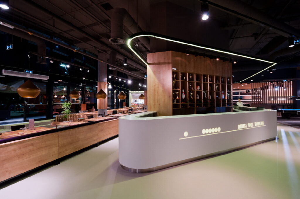 Trickshot shopping center reception by HIMACS solid surface