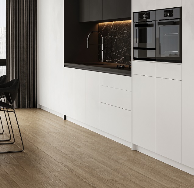 The contrast between the light wood and white cabinets adds a charming touch.