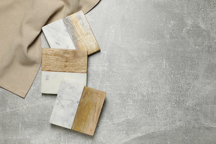 If you add a coaster to granite or marble, it can be a good design element.