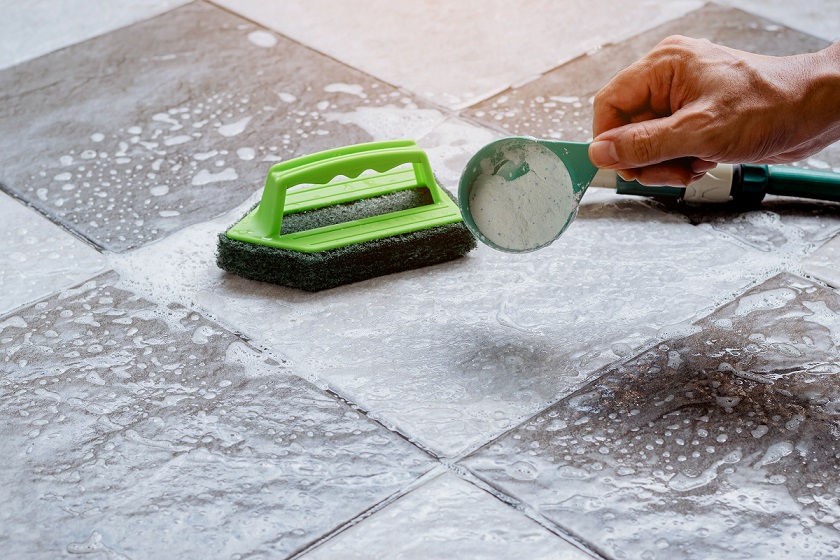 Before sanding the surface of the tile, you must cleanse the surface of the debris.