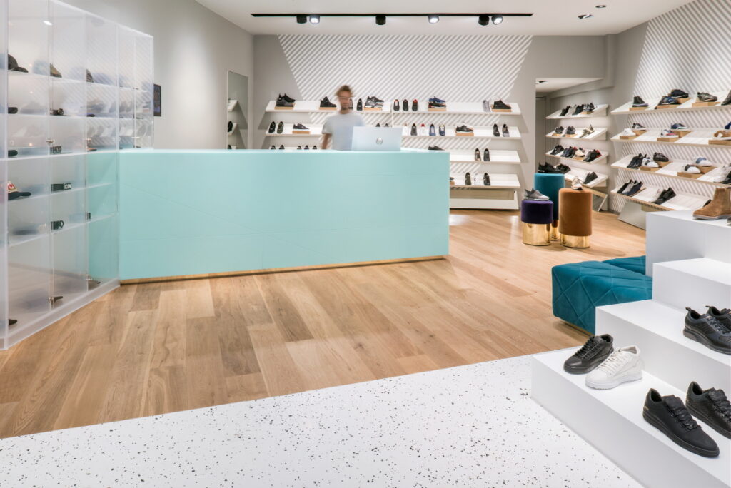 Oblique store display area designed by HIMACS solid surface