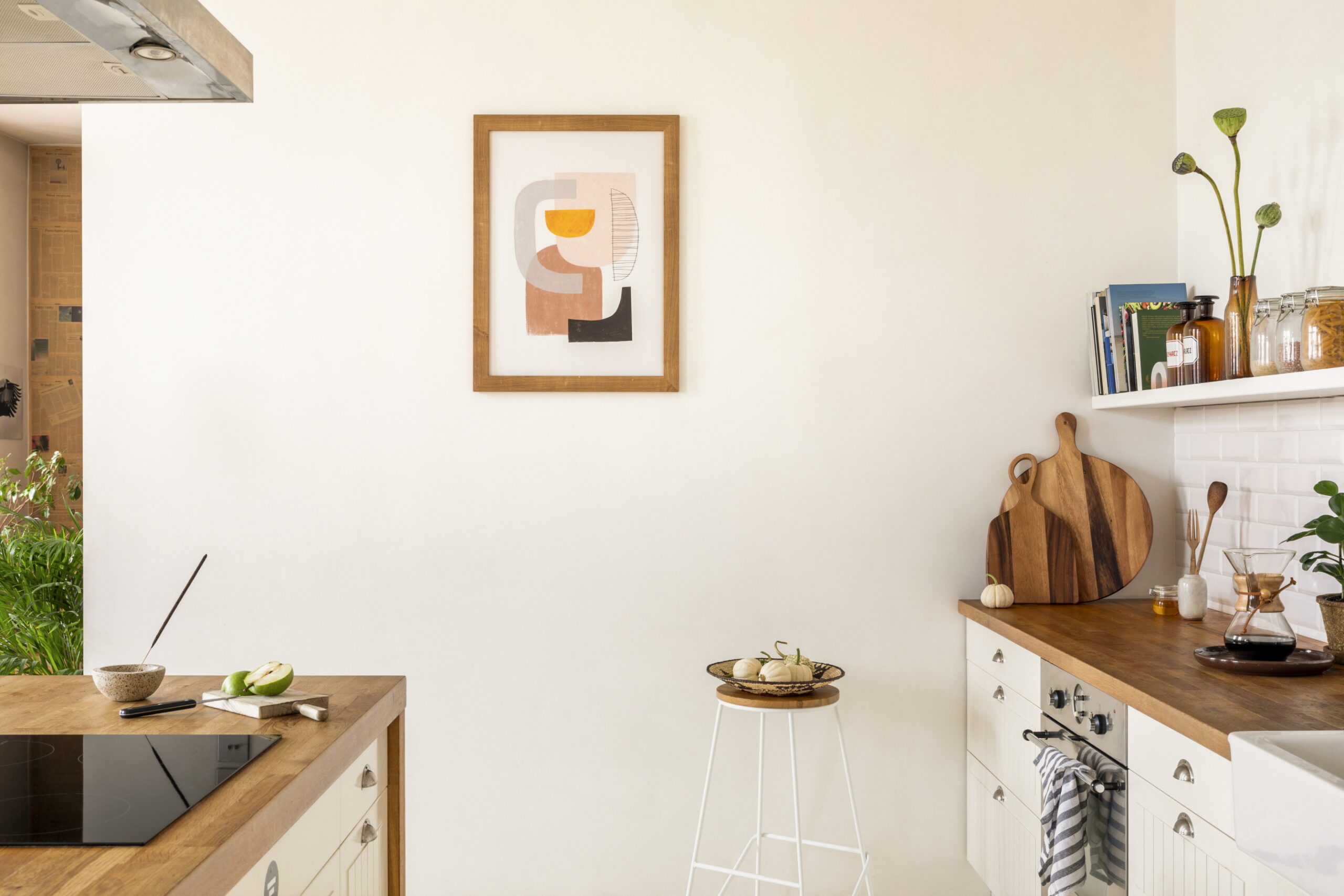 Personalize your kitchen by hanging artwork on the walls to reflect your personality.