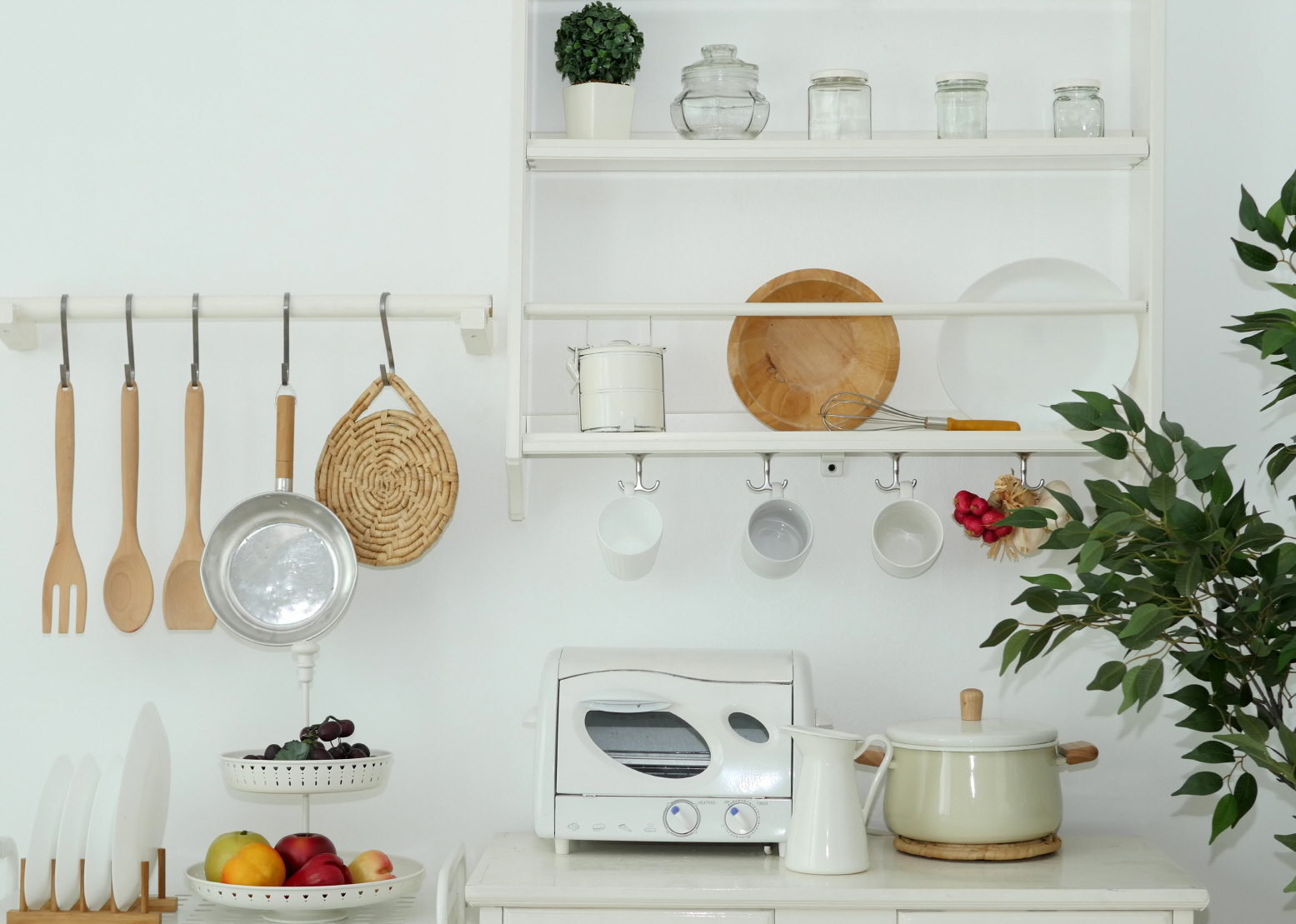 Turn kitchen tools into art with hooks, pegboards, or magnetic strips.