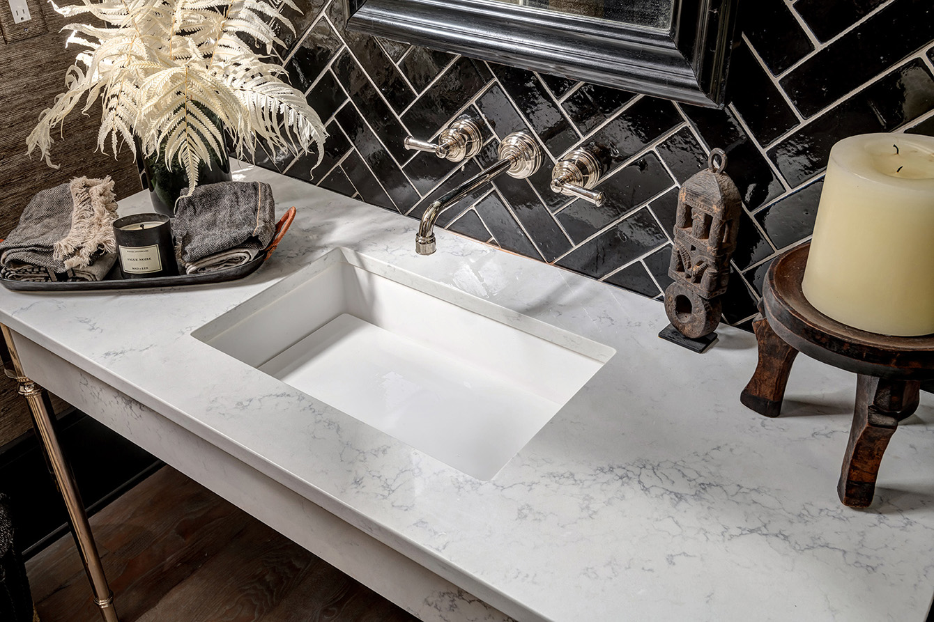 LX Hausys VIATERA - Dark quartz and porcelain with white veining offer sleek contrast.