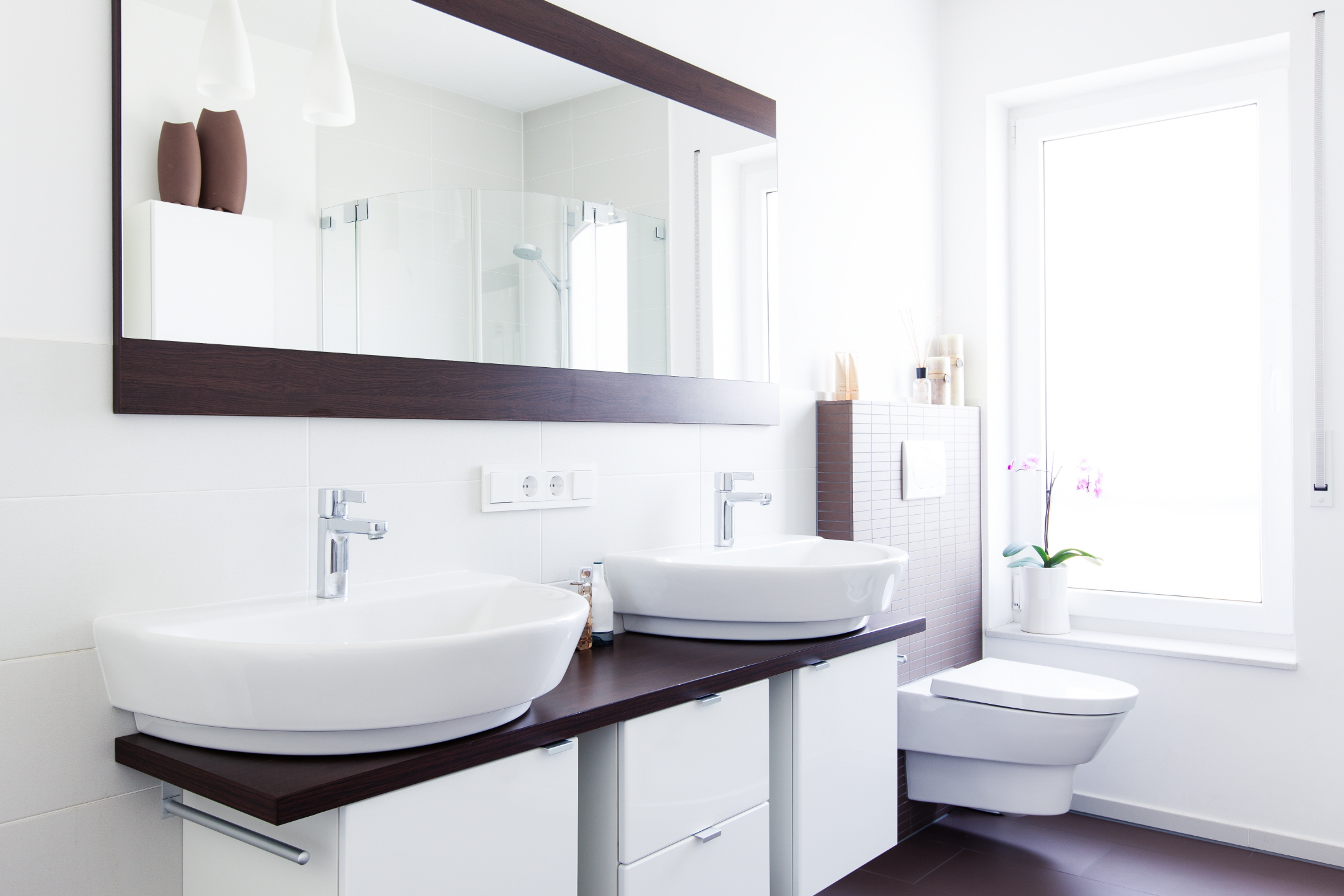 Maximize functionality with double sink vanities for a luxurious solution.