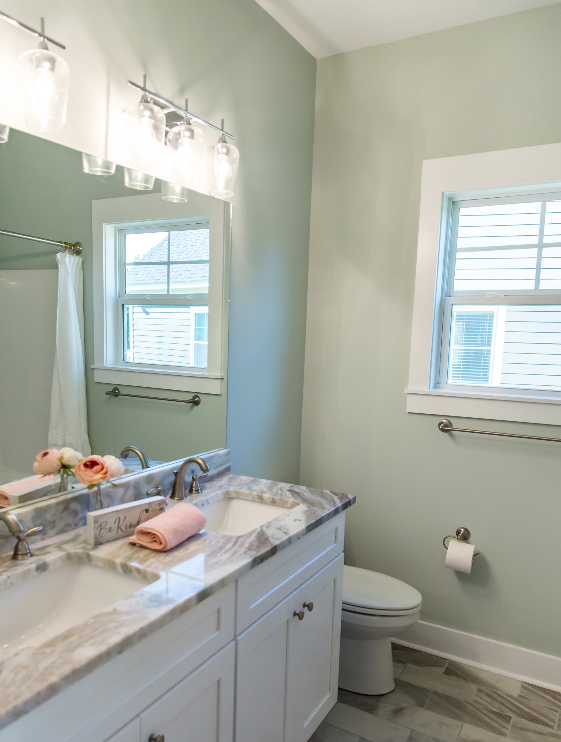 Minty green adds brightness and cheer to small bathrooms without overpowering the space.