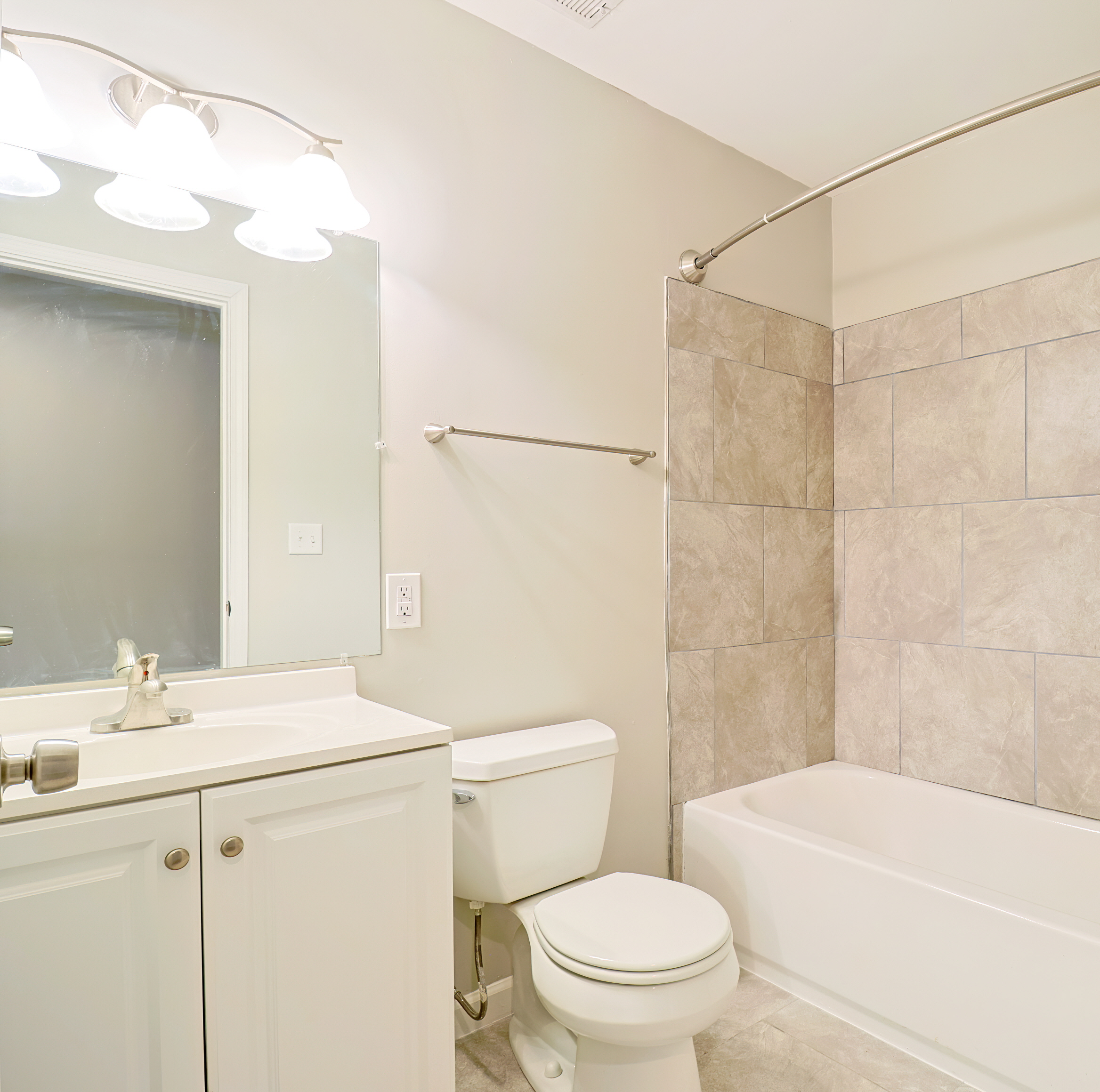 Neutral colors like beige, taupe, and ivory create a calm and timeless atmosphere in small bathrooms.