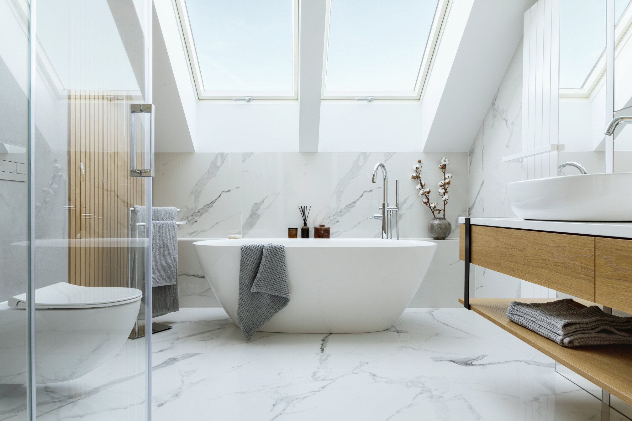Porcelain tiles have a low water absorption, a smooth finish, a single color, longer lasting, and are suitable for vintage or minimal bathrooms.