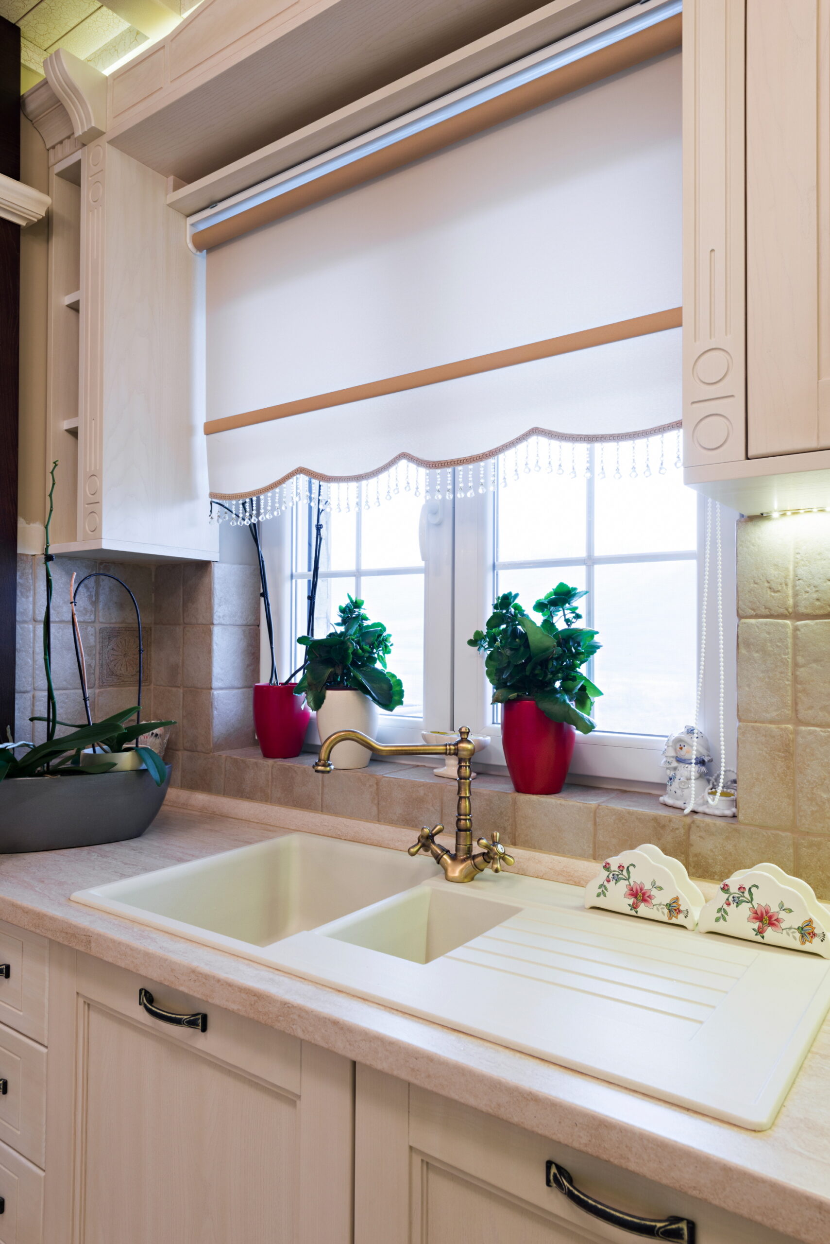 Use sheer curtains, plants, and mirrors in your kitchen to amplify natural light.