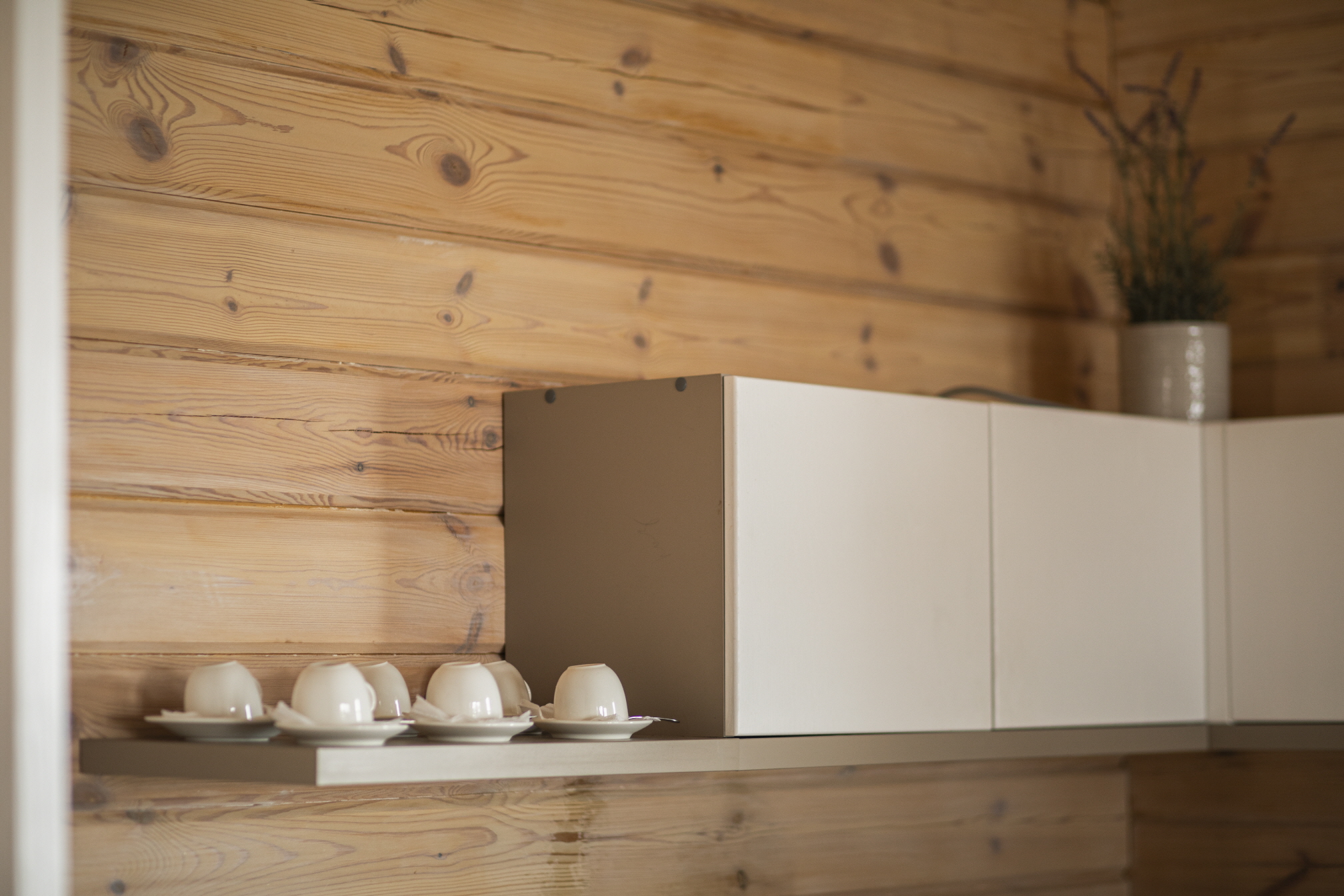 Get modern farmhouse vibes in your budget kitchen remodel with antique storage and repurposed decor.