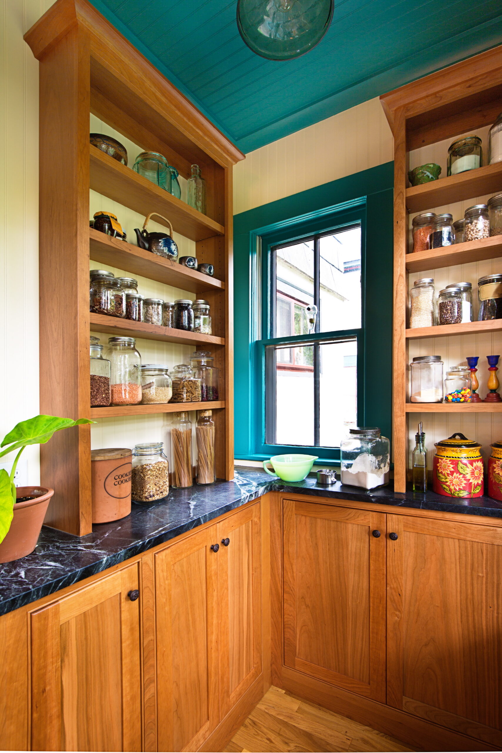 When remodeling a small kitchen, maximizing limited pantry space is essential.