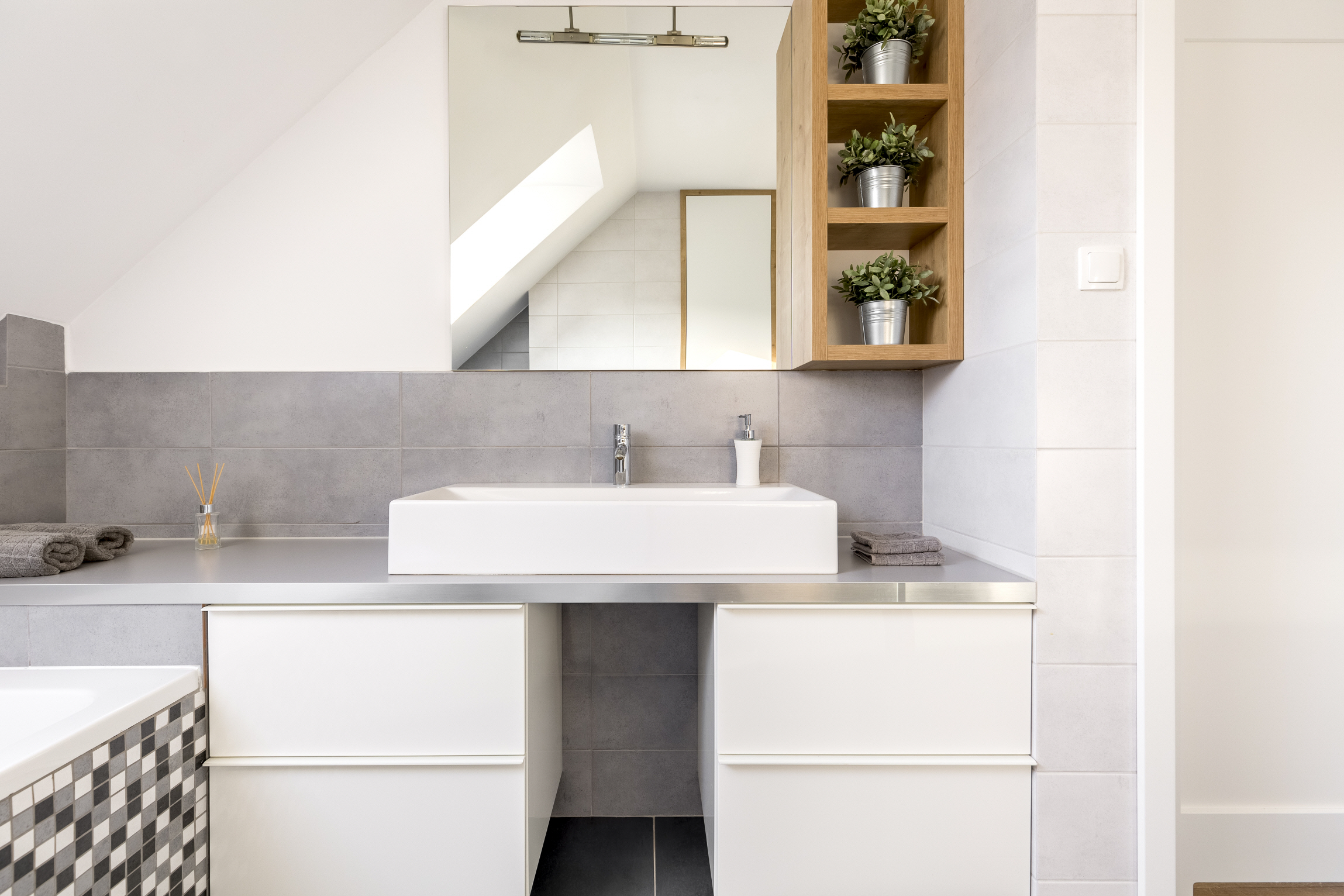 Even a small bathroom can feel open and inviting with the right approach.