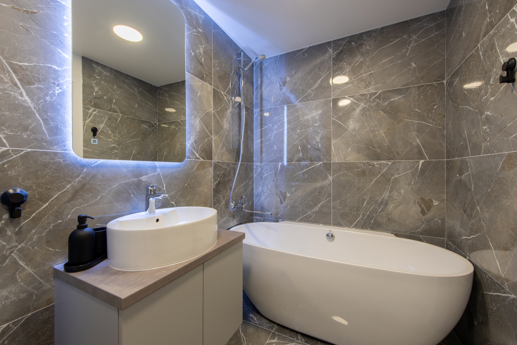 Tech-integrated bathroom with LED lighting